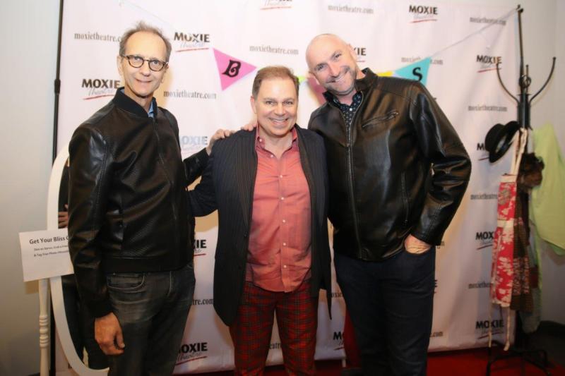 3 Roustabouts' co-founders in theatre lobby after play reading.