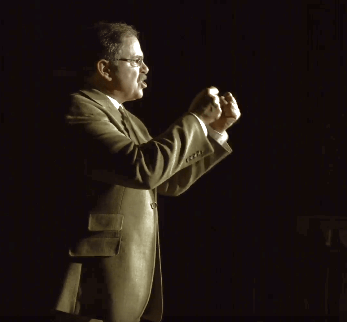 Actor Phil Johnson as President Theodore Roosevelt addressing the crowd