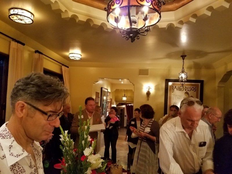 Guests in dining room enjoying food