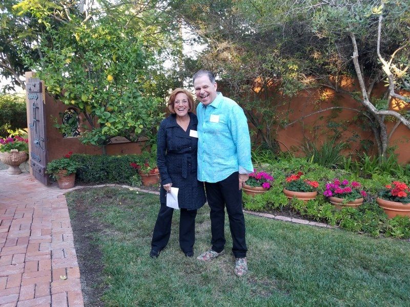 2 guests standing outdoors