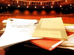 Pile  of play scripts on a theatre stage