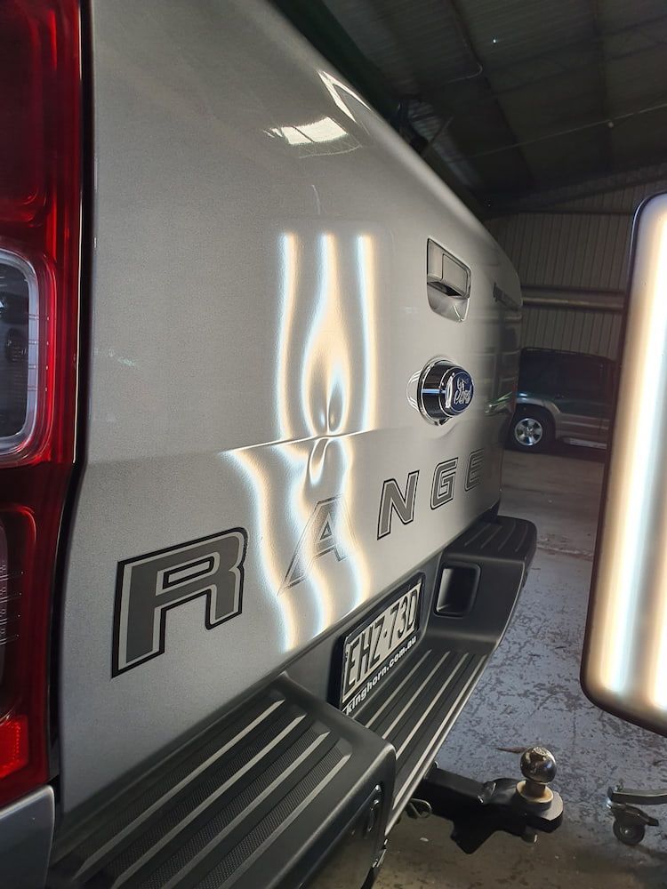 A ranger has light shining on the back — Dynamic Dentz Smash Repair in South Nowra, NSW