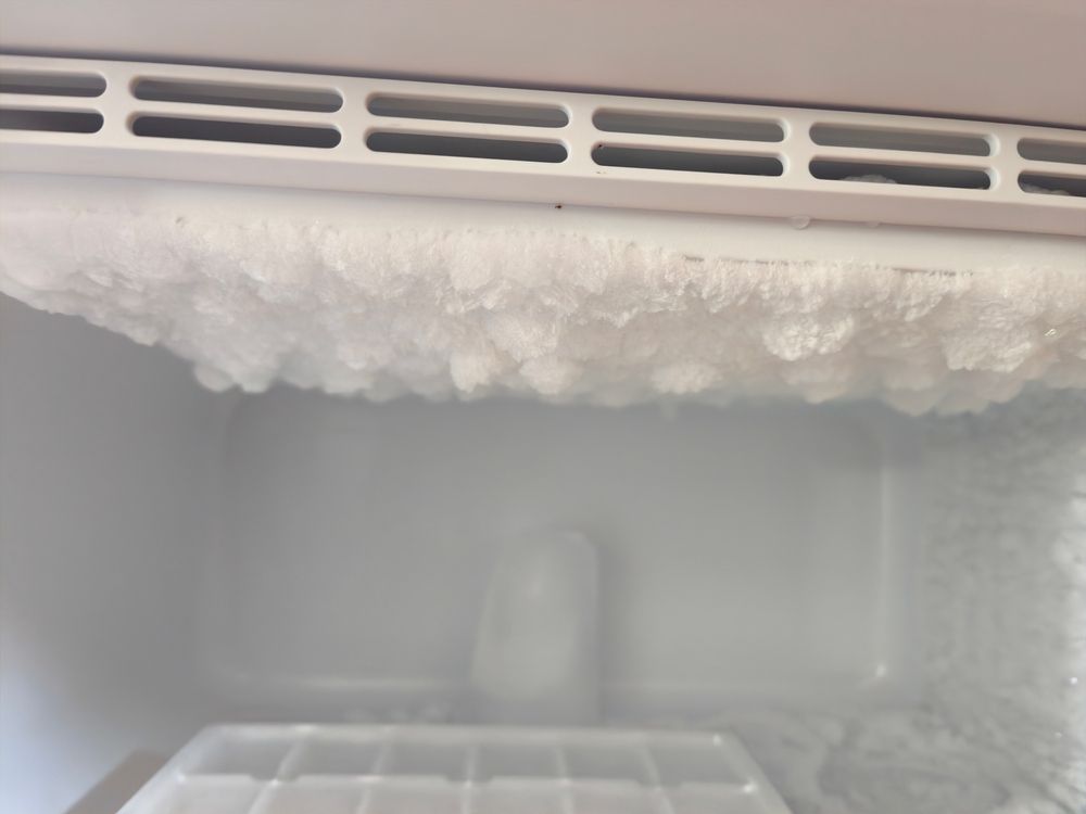 Inside of a Freezer, Showing a Thick Layer of Ice Buildup Along the Top — SealTite in Terranora, NSW
