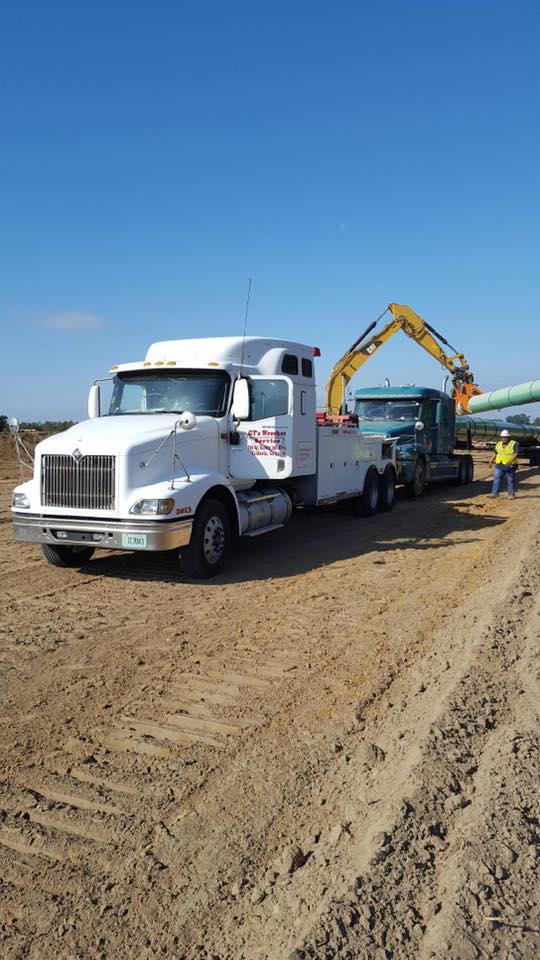 Truck on Empty Field — Valdosta, GA — GT’s Wrecker Service