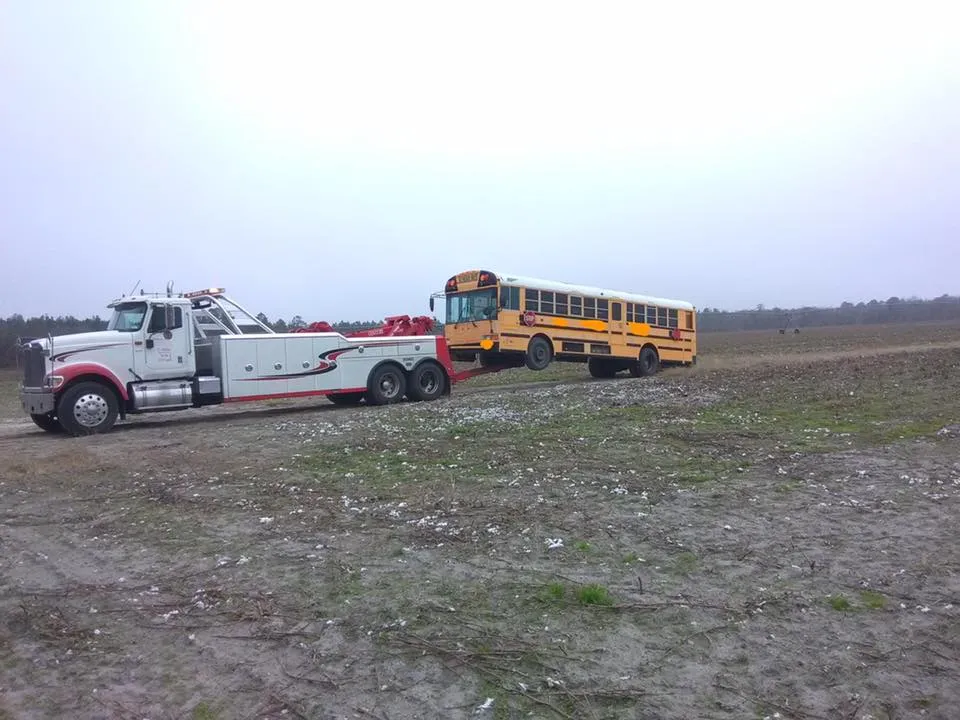 White Truck and Yellow Bus — Valdosta, GA — GT’s Wrecker Service