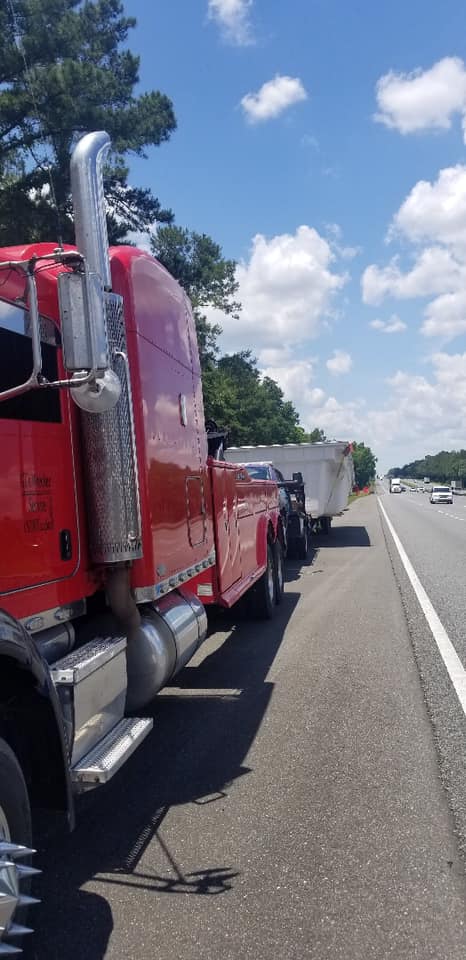 Red Truck on Road — Valdosta, GA — GT’s Wrecker Service