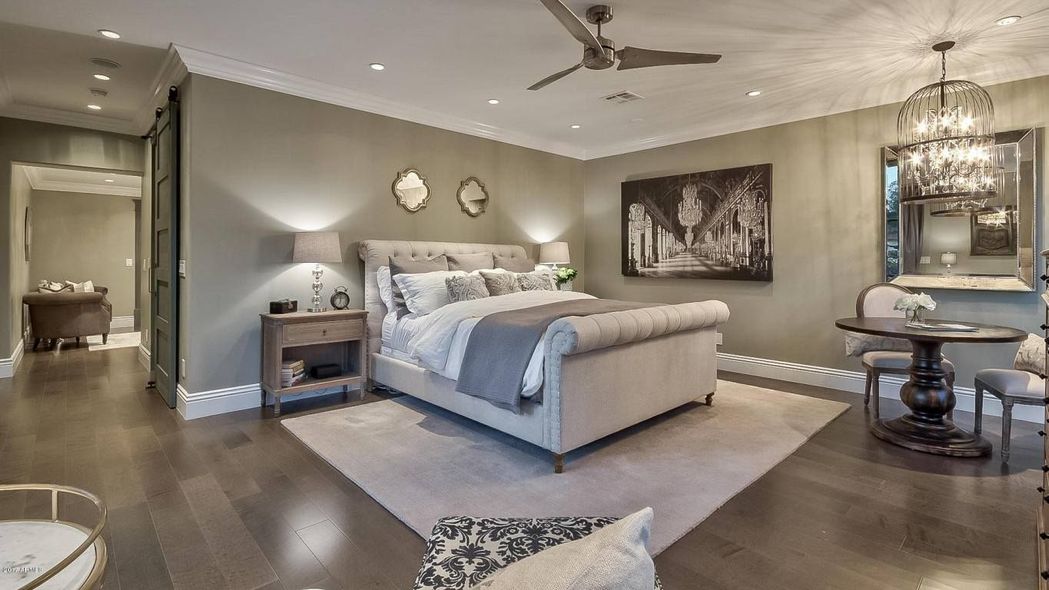 There is a large bed in the middle of the room.