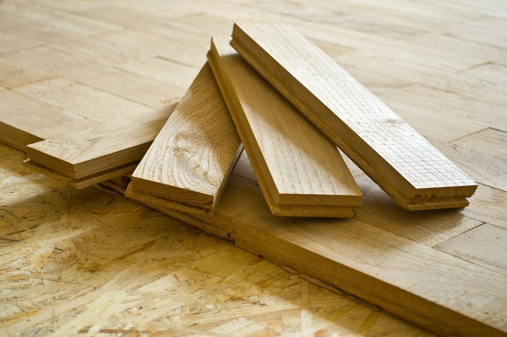 Four Pieces of Wood Are Stacked on Top of Each Other — Gnomes Landscape & Garden Supplies In Wauchope, NSW