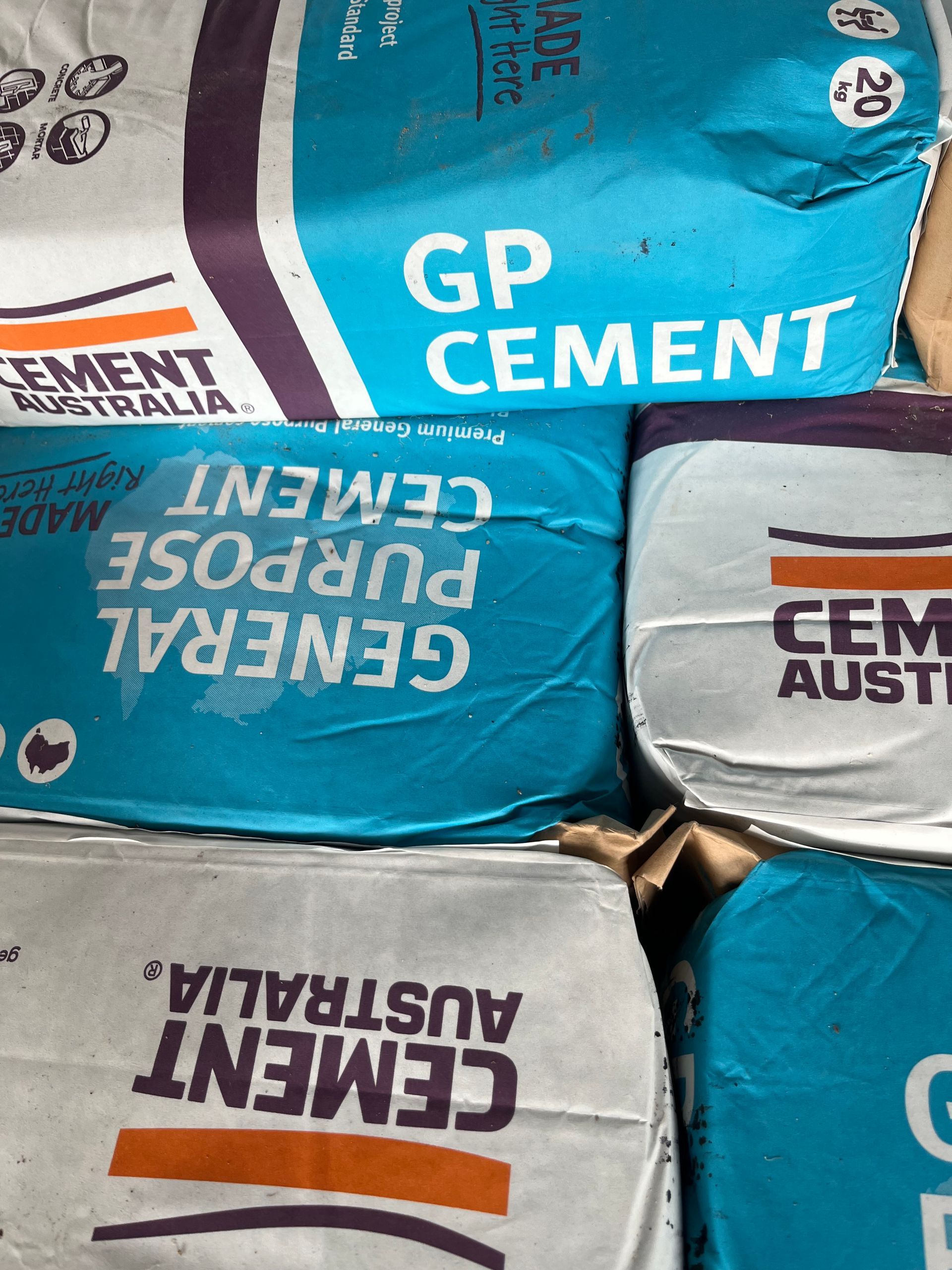 A Pile of Bags of Cement  — Gnomes Landscape & Garden Supplies In Taree South, NSW