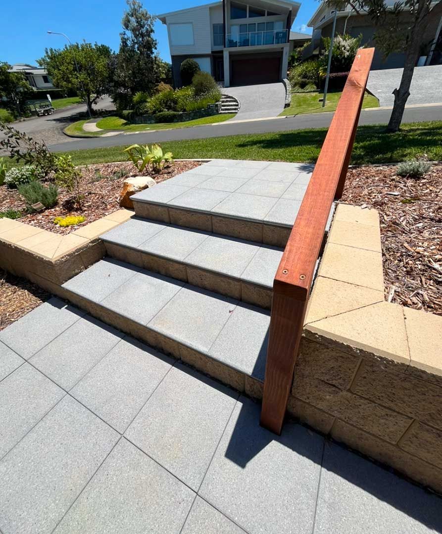 Stairs Leading Up To A House With A Wooden Railing — Gnomes Landscape & Garden Supplies In Gloucester, NSW