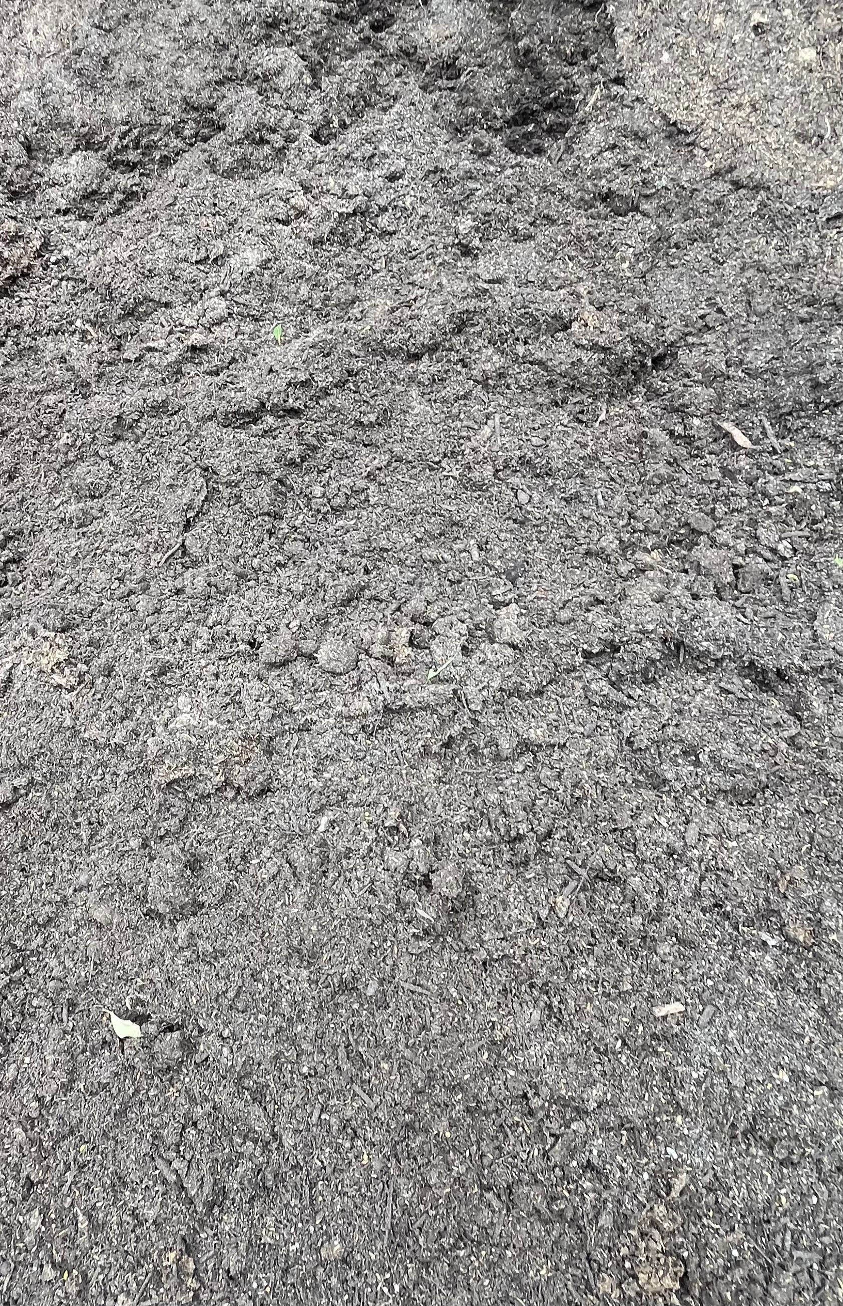 A pile of organic soil — Gnomes Landscape & Garden Supplies In Taree South, NSW