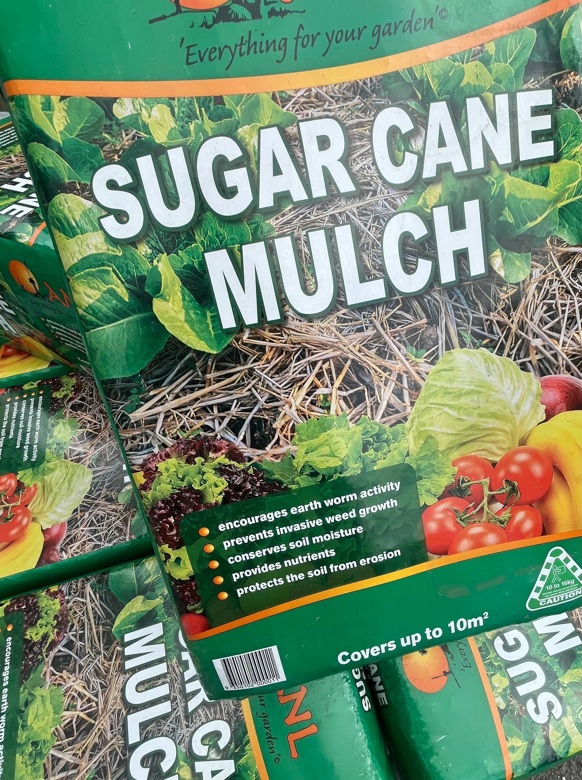 A Stack of Sugar Cane Mulch Bags — Gnomes Landscape & Garden Supplies In Taree South, NSW