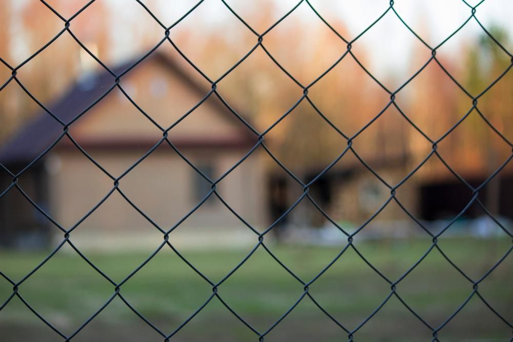 A close up of a dog fence— Gnomes Landscape & Garden Supplies In Taree South, NSW