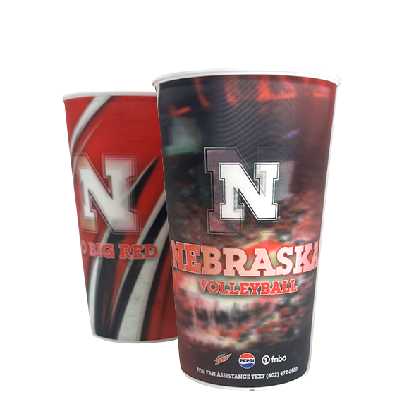 Two Nebraska Cornhuskers cups with red, white, and black design, the letter "N" logo, and volleyball text.