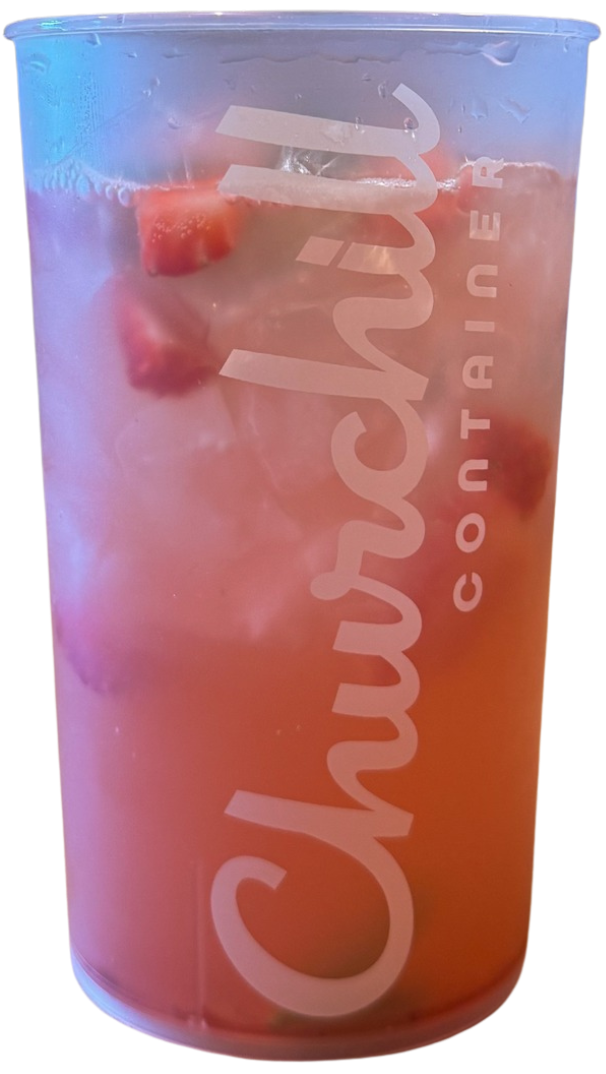 Tall clear plastic cup with strawberry lemonade and ice.