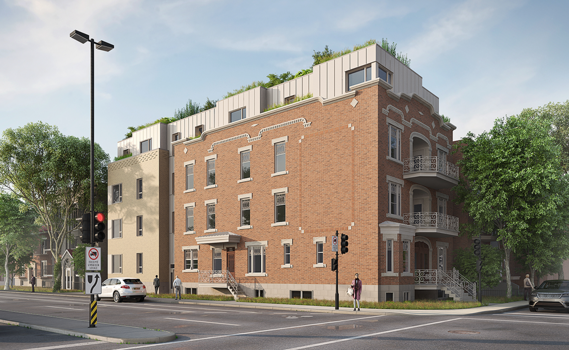 Brick building with modern rooftop addition on a city street; cars and trees visible.