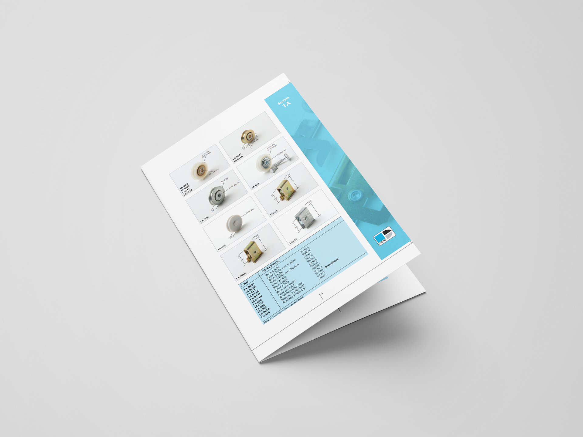 Brochure with product images and text, angled on a light gray surface.