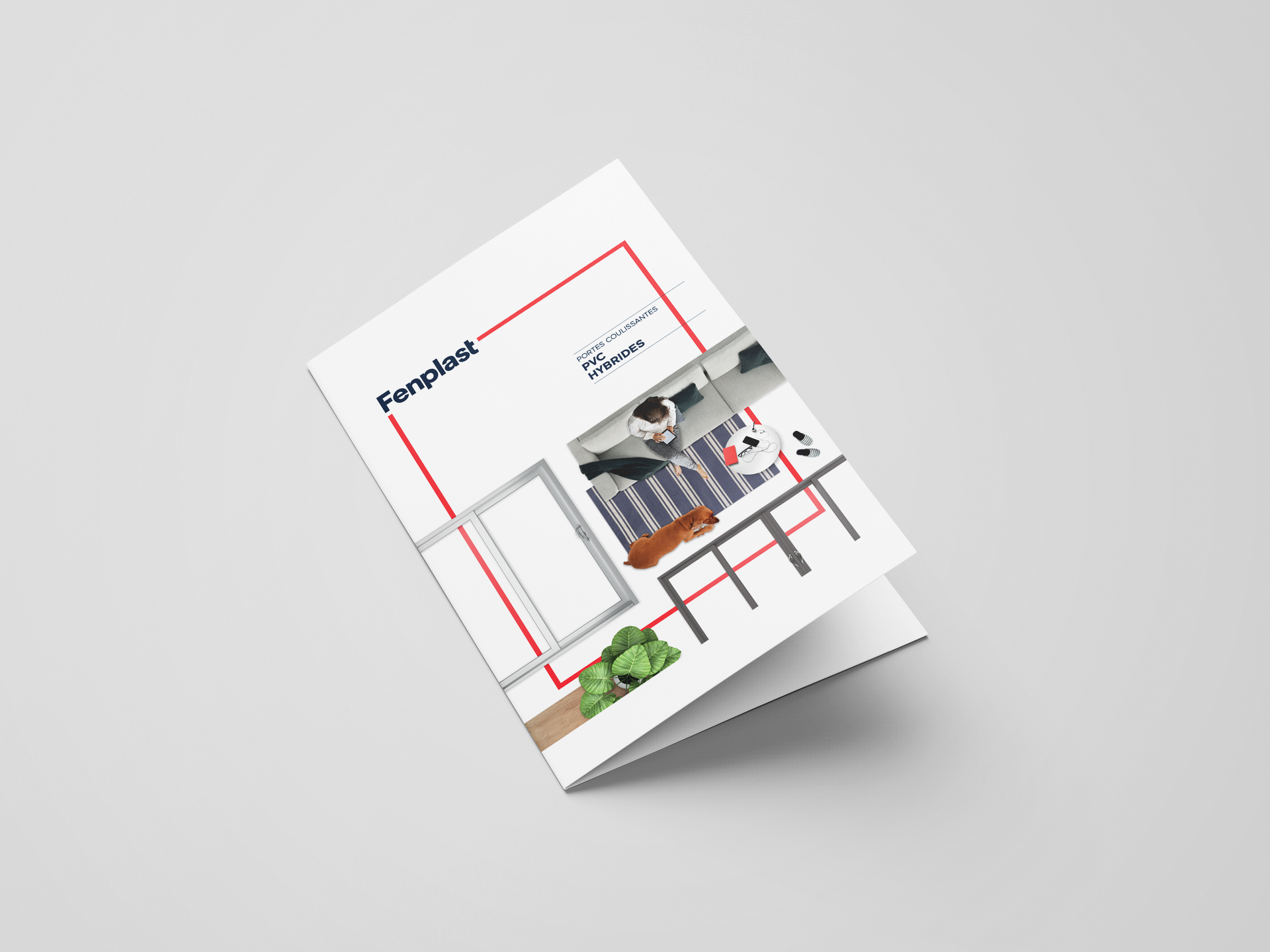 Brochure with a red frame, showcasing a room interior with furniture and a window.