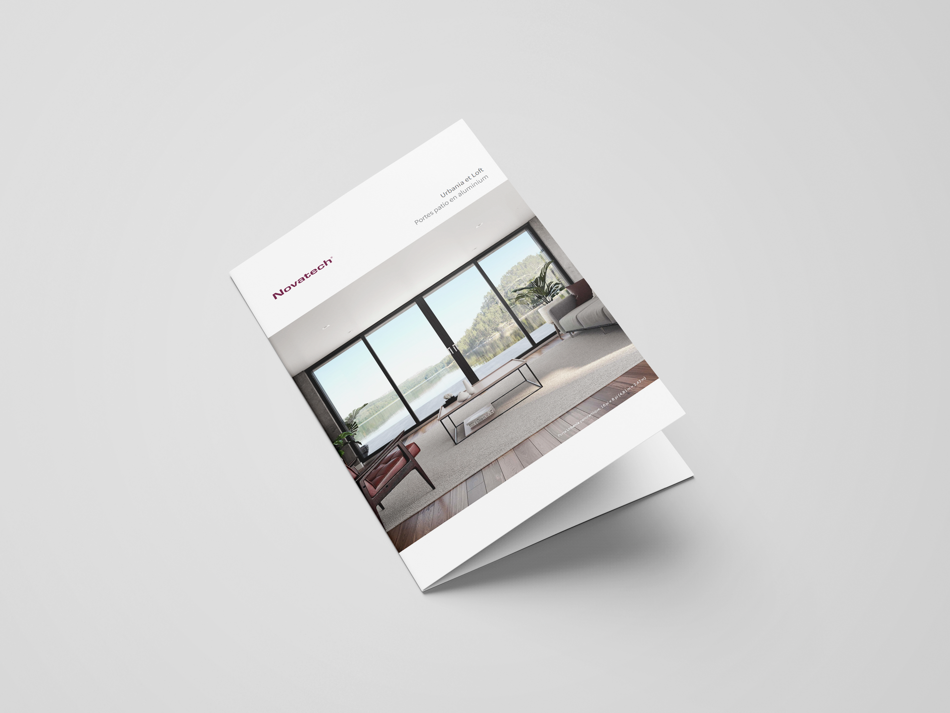 Brochure mockup featuring a modern interior with large windows and a view.