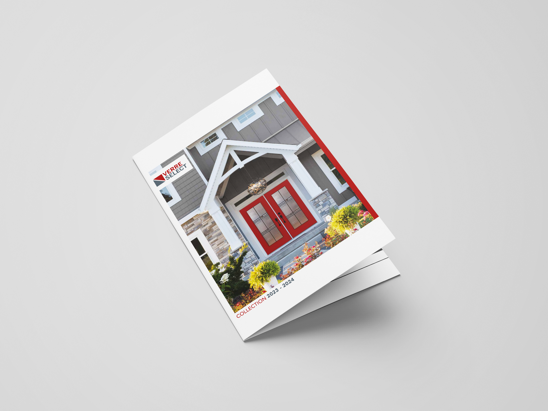 Brochure showcasing a house's red door, gray siding, and a white entrance. Red and white logo in the top corner.