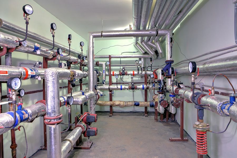 A room filled with lots of pipes and valves.
