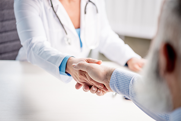 Doctor Shaking Hands With Patient — Gulf Shores, AL — Jeanne Birkenhauer, MD, PC