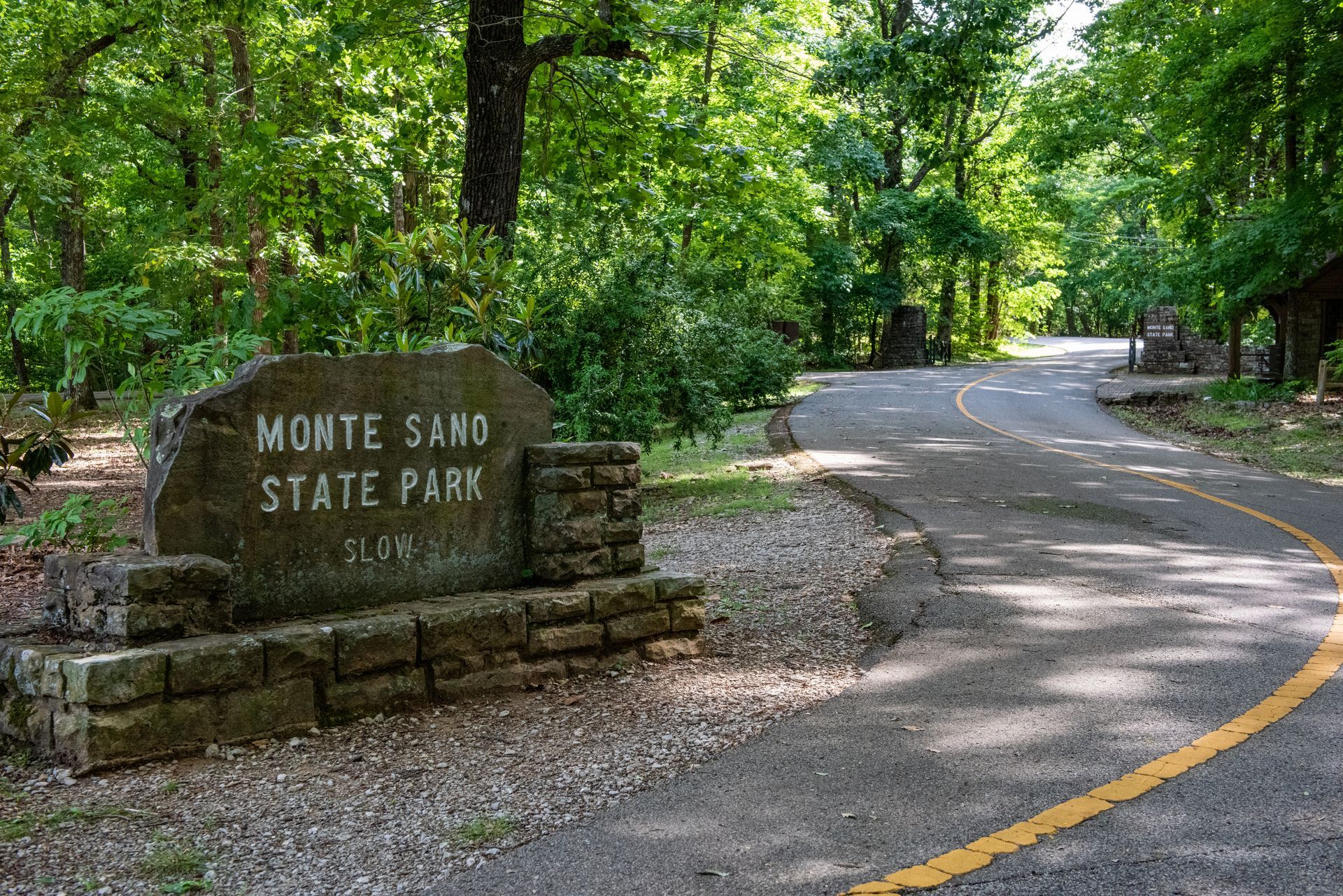 A stone entrance sign reading 