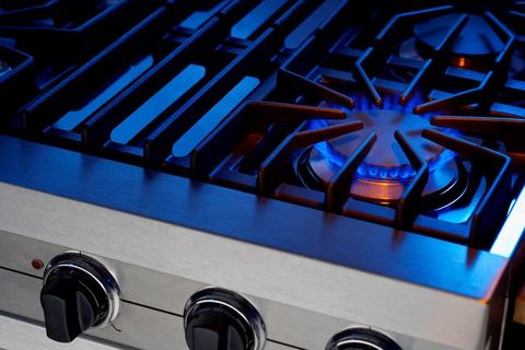 Stove Top with blue gas flame