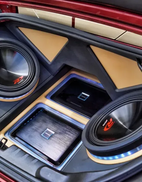 A car with alpine speakers in the trunk