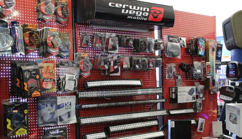 A red wall with a sign that says corwin vega on it