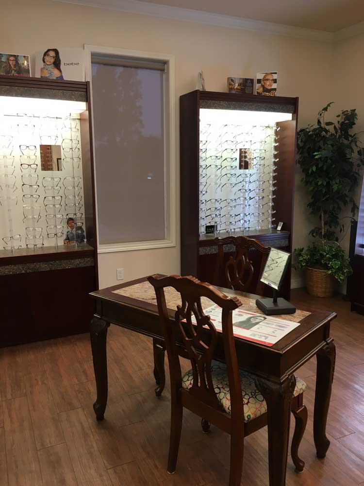 Eye Glasses Rack near a Table — Eyeglasses in Corpus Christi, TX