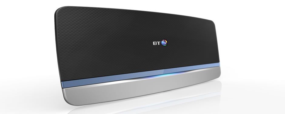 A bt device is sitting on a white surface
