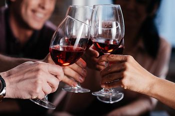 friends enjoying wine together