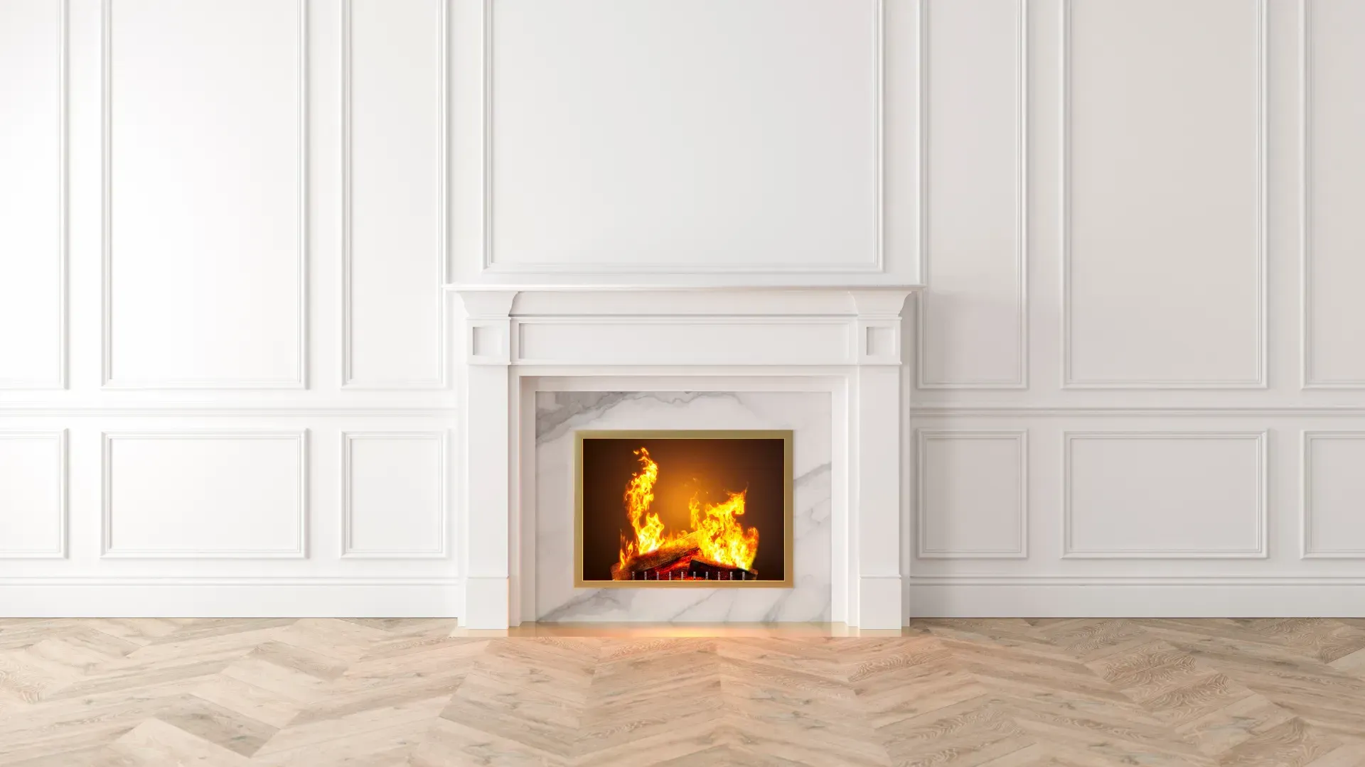 White marble fireplace with fire, set in a white-paneled wall above light wood floor.