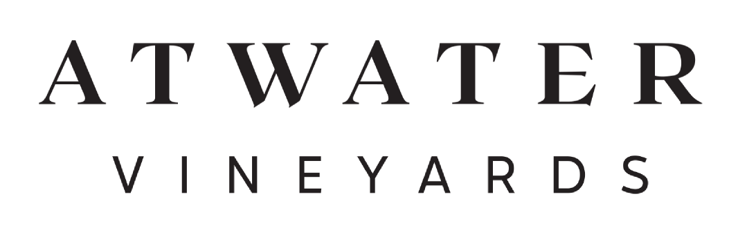 The logo for atwater vineyards is black and white.