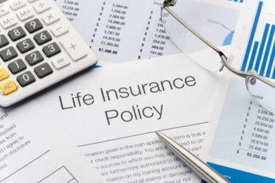 Close up of Life Insurance Policy with Pen, Calculator  — Life Insurance in Miami, FL