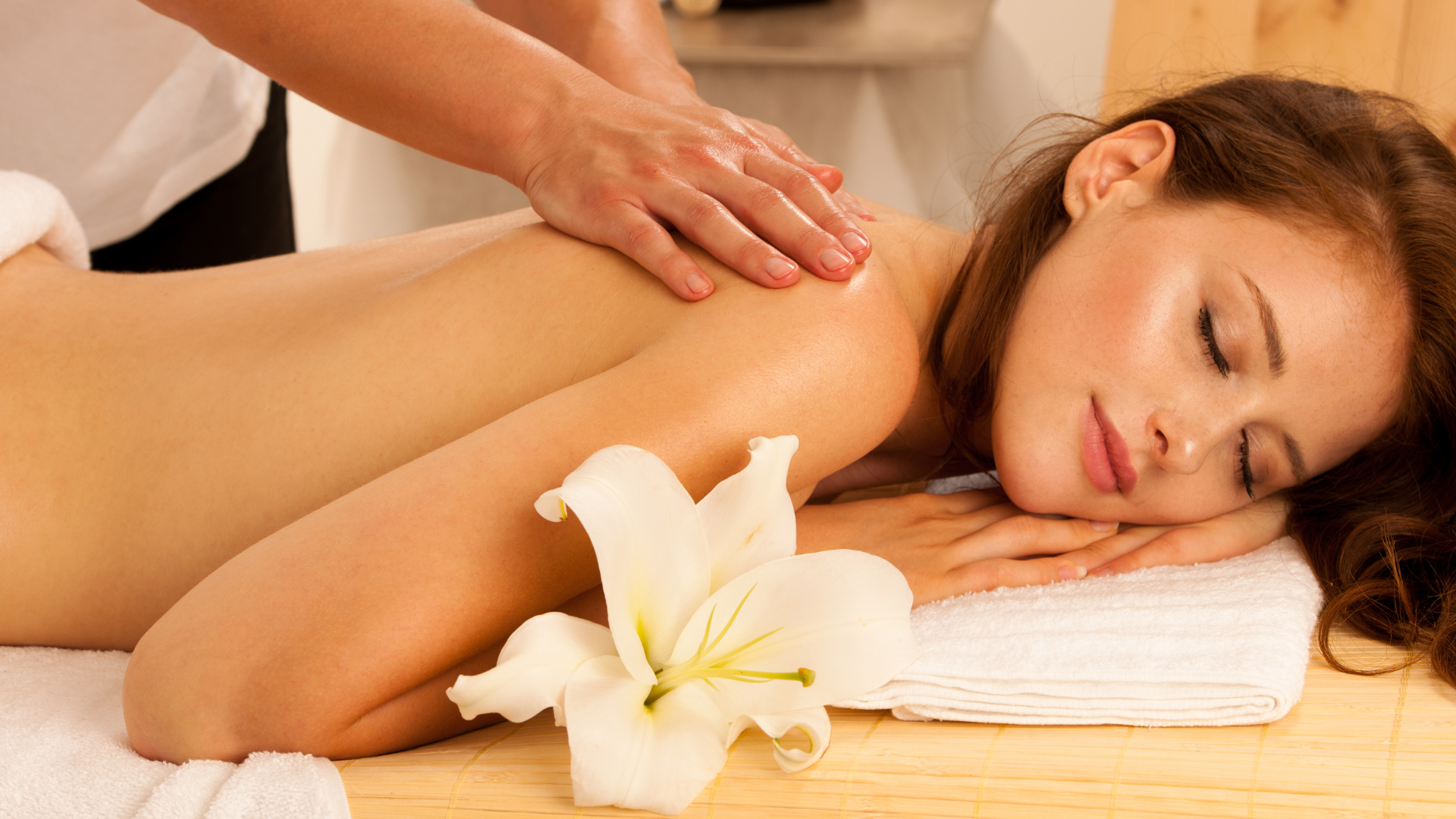 A woman is getting a massage at a spa.