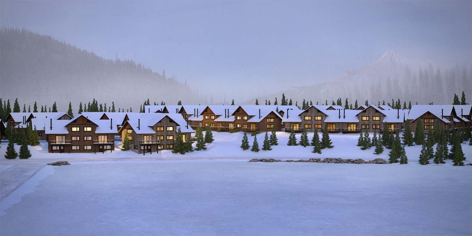 A row of houses covered in snow in the middle of a snowy forest.
