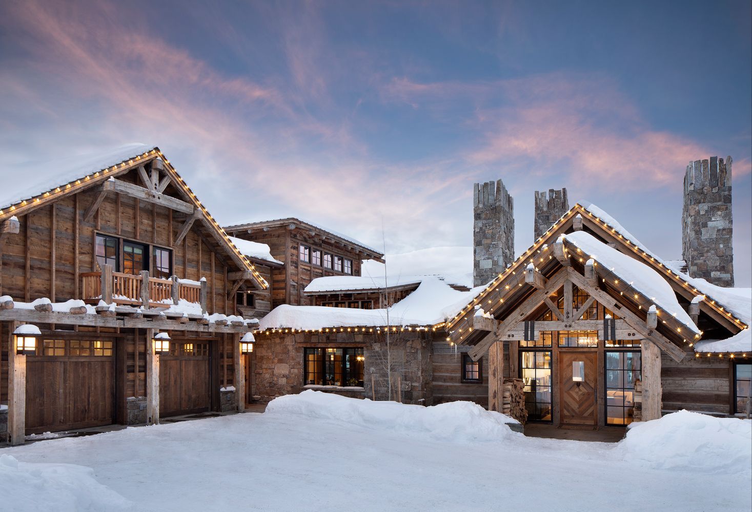 A large house with a lot of snow on it