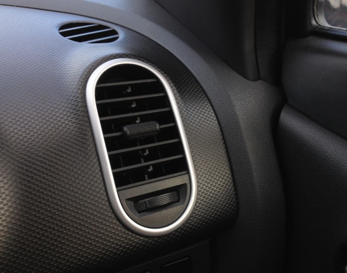 A Close Up Of An Air Vent In A Car — Bartons Auto Air Conditioning In Tolga, QLD