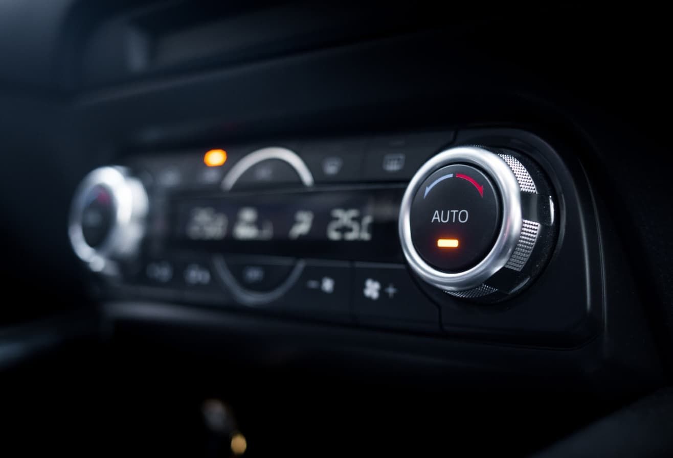 A Close Up Of A Car Air Conditioning Control Panel — Bartons Auto Air Conditioning In Tolga, QLD