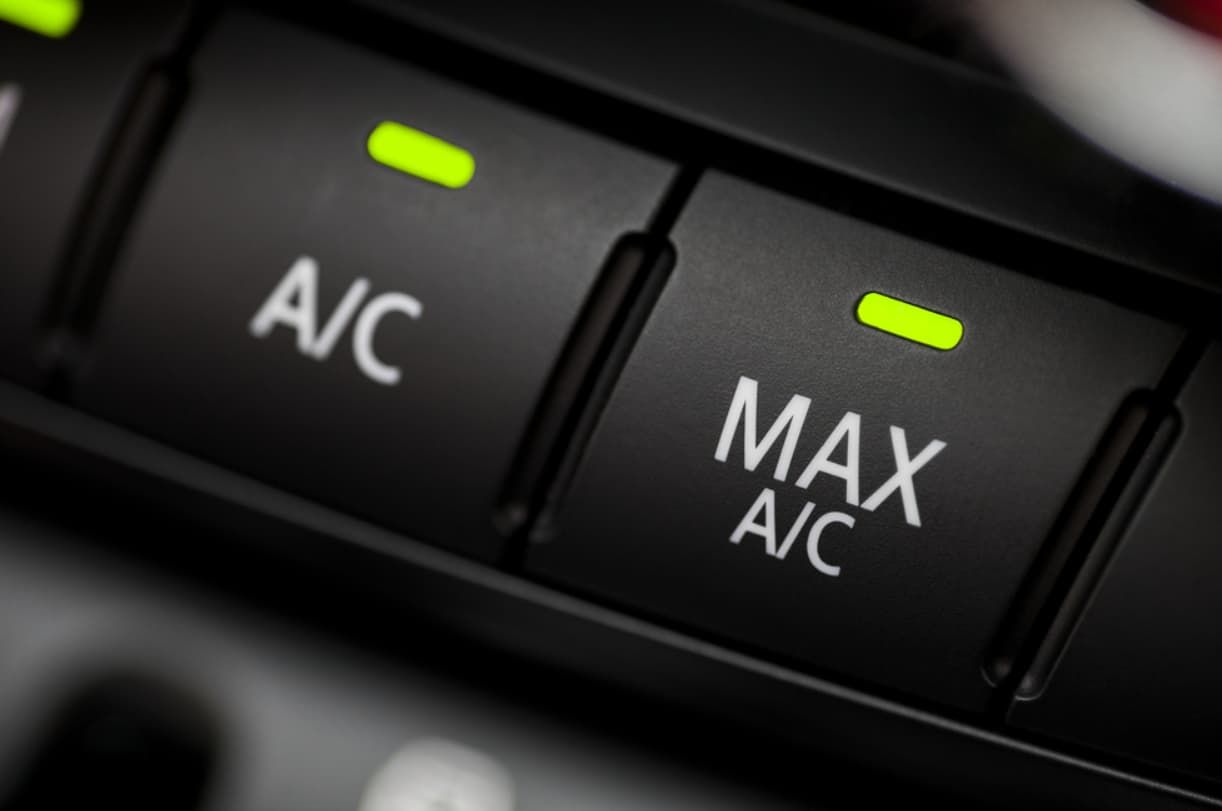 A Close Up Of A Car A/c And Max A/c Button — Bartons Auto Air Conditioning In Tolga, QLD