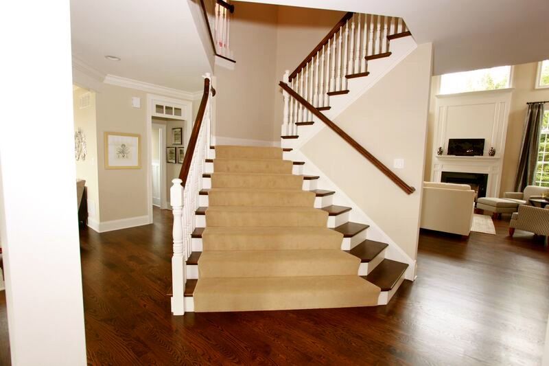A staircase leading up to the second floor of a house