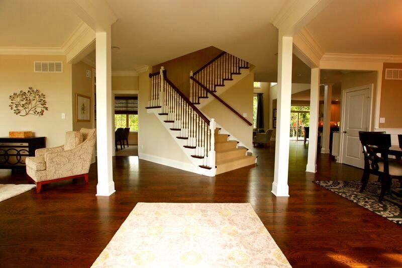 A house with a staircase leading up to the second floor