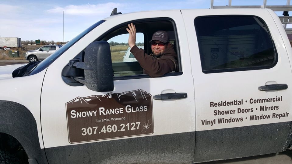 A Man on the Truck — Laramie, WY — Snowy Range Glass