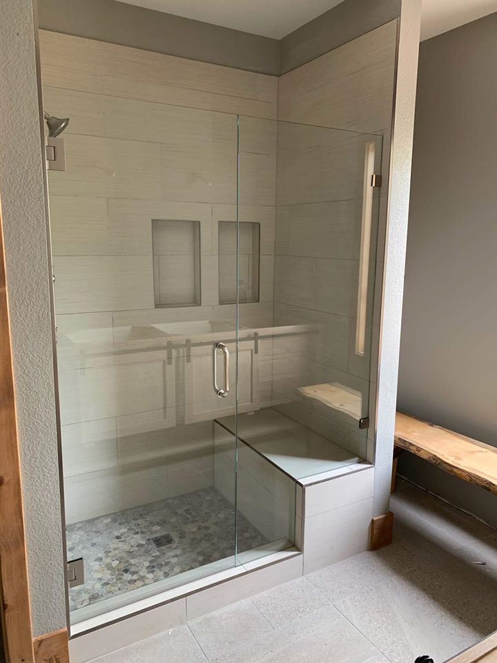 A Glass Door with a Metal Handle — Laramie, WY — Snowy Range Glass