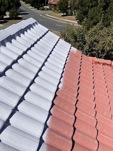 A Red Roof Being Painted Light Grey — A&J Painting In Weston Creek, NT