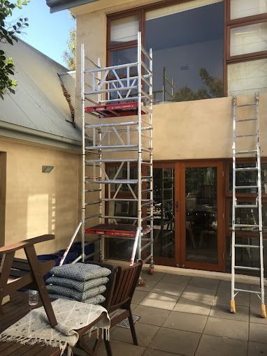 A Child's Room With a Table, Chairs, and a Wooden Wagon — A&J Painting In Gungahlin, NT