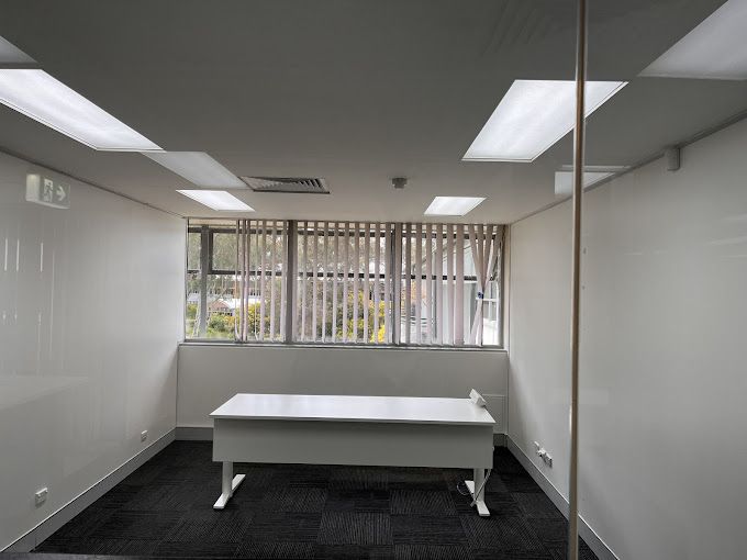 A Room is Being Painted Blue and White With a Ladder in the Foreground — A&J Painting In Gungahlin, NT