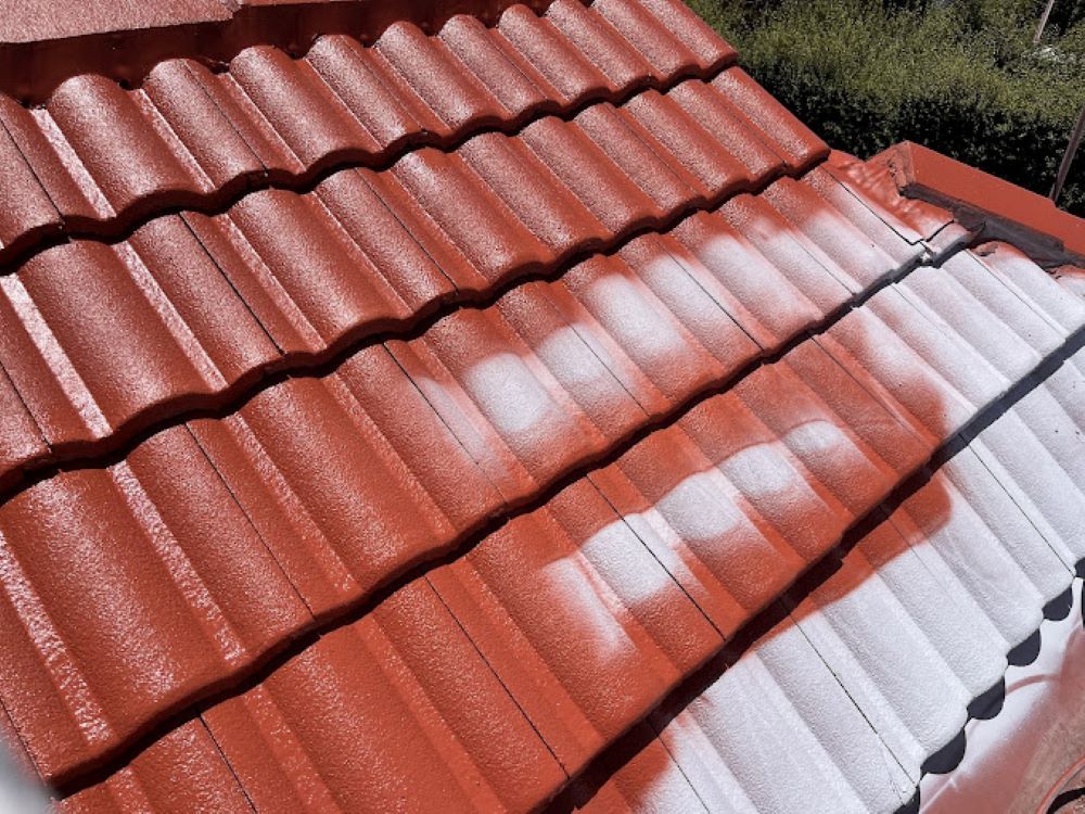 A Red Tile Roof With White Paint on It — A&J Painting In Gungahlin, NT